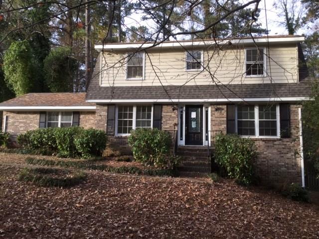 Large 4 bedroom 2.5 baths with a basement on a flat lot.  This is a brick and frame home with a 2 car garage.  New paint and carpet and existing Hardwoods on the 2nd floor.******If you are an Investor looking for rental property this is it.....  last tenant paid $1175 a month******