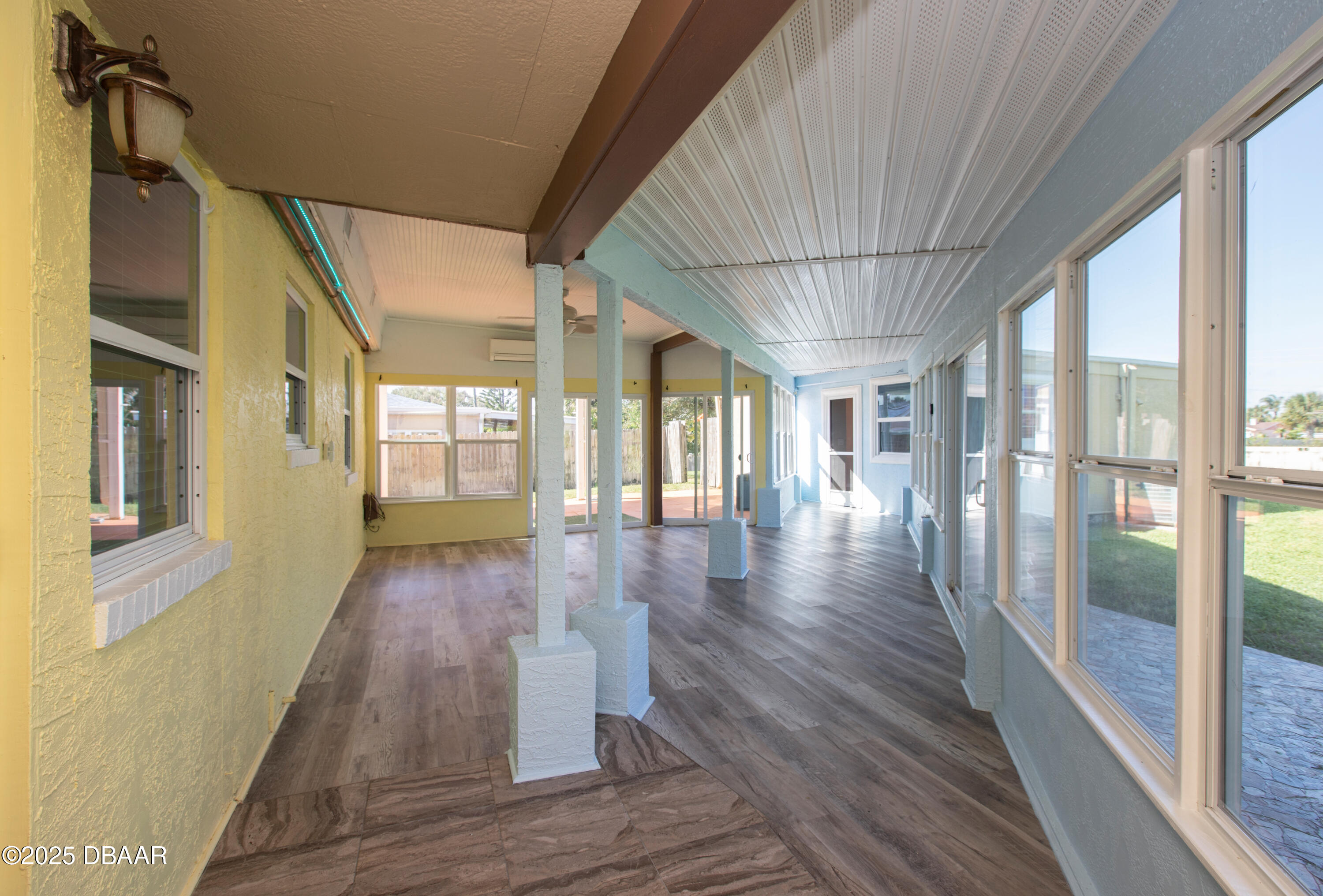 131 Minerva Road Daytona Beach, FL 32118 - Photo 18 of 21 a view of interior space with wooden floor and windows