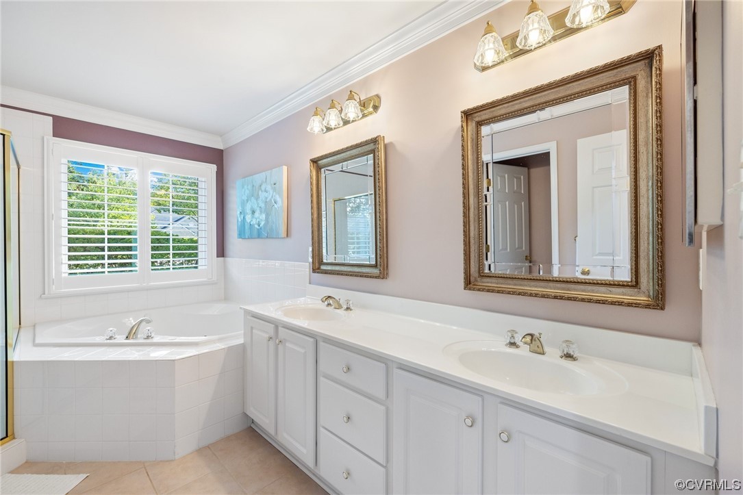 5000 Park Commons Loop Glen Allen, VA 23059 - Photo 19 of 32 a bathroom with a sink and a bathtub