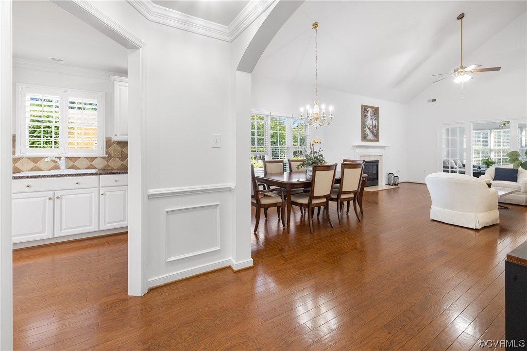 5000 Park Commons Loop Glen Allen, VA 23059 - Photo 4 of 32 a view of a dining room with furniture window and wooden floor