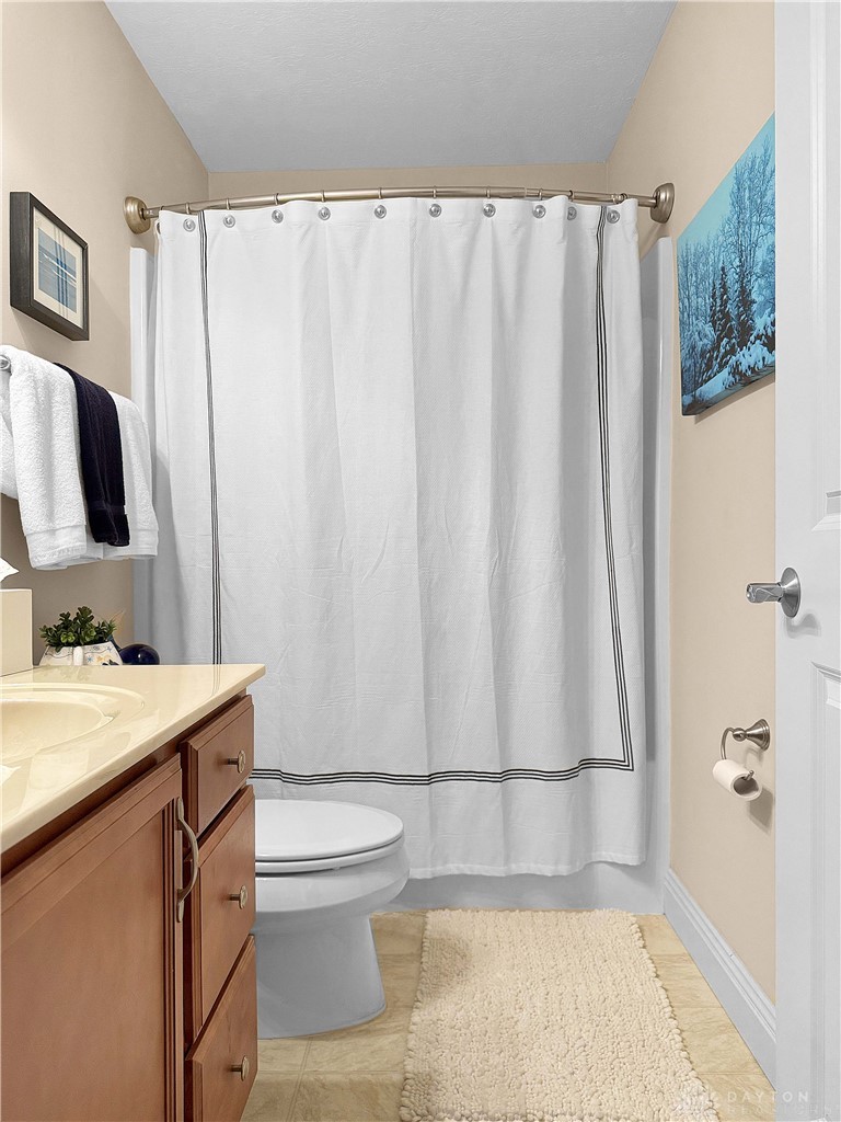 4096 Middle Urbana Road Urbana, OH 43078 - Photo 70 of 96 This clean and inviting bathroom features a functional vanity and a classic shower.
