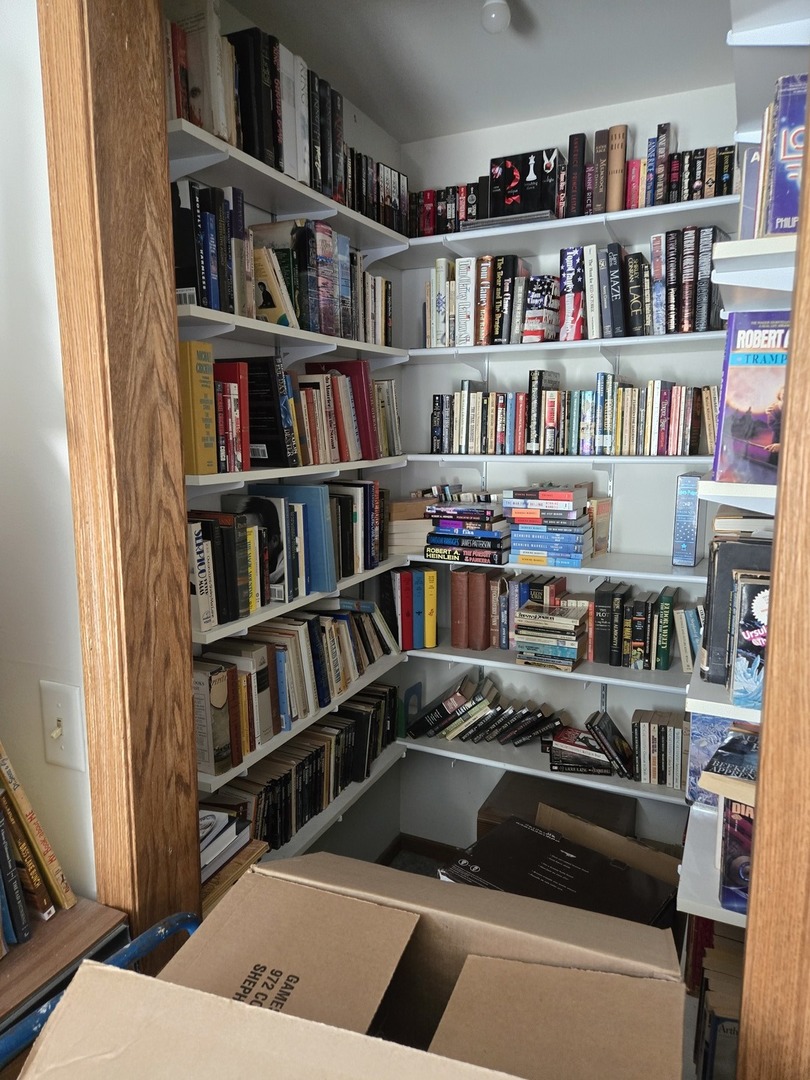 513 Appleton Drive Batavia, IL 60510 - Photo 17 of 31 a room with bookshelf and a book shelf
