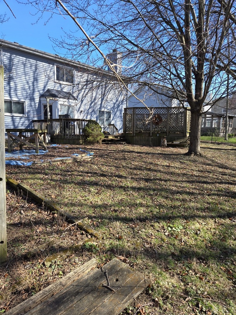 513 Appleton Drive Batavia, IL 60510 - Photo 29 of 31 a view of a building with a yard