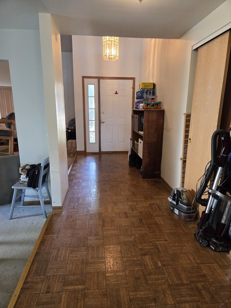 513 Appleton Drive Batavia, IL 60510 - Photo 3 of 31 workspace with wooden floor and windows