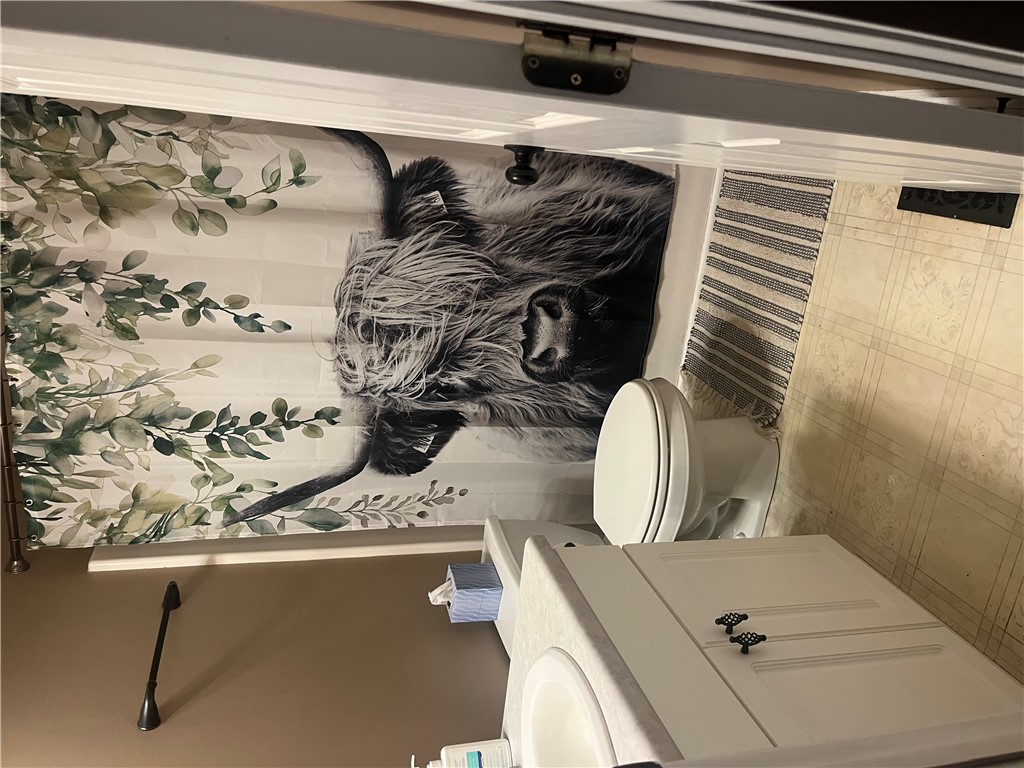 736 Rodgers Road Seneca, SC 29678 - Photo 7 of 7 This bathroom features practical flooring and essential fixtures for daily routines.