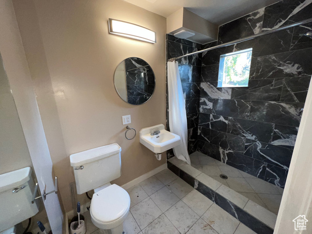 642 East 700 North Logan, UT 84321 - Photo 20 of 33 Full bathroom with a stall shower and tile patterned flooring