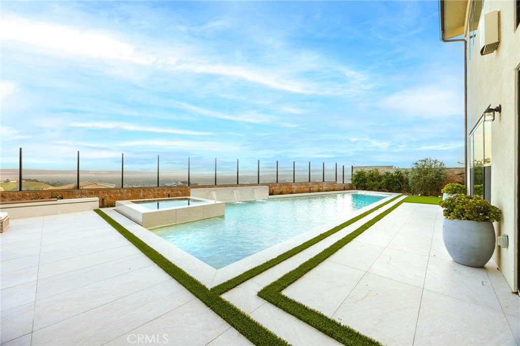 20138 Marlow Lane Porter Ranch, CA 91326 - Photo 34 of 39 a view of swimming pool with a lounge chairs