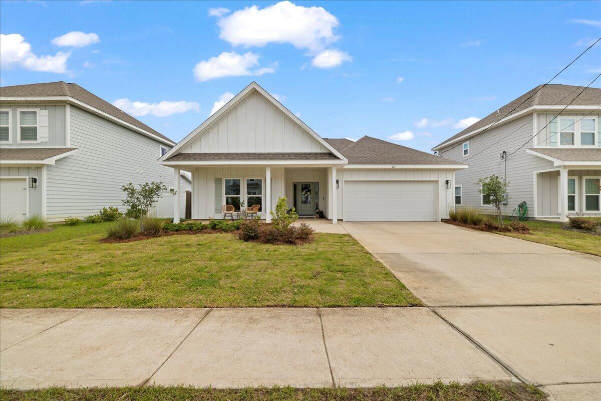 613 Las Roblas Grande Drive Santa Rosa Beach, FL 32459 - Photo 30 of 36 Newly Sodded Front Lawn + Garage