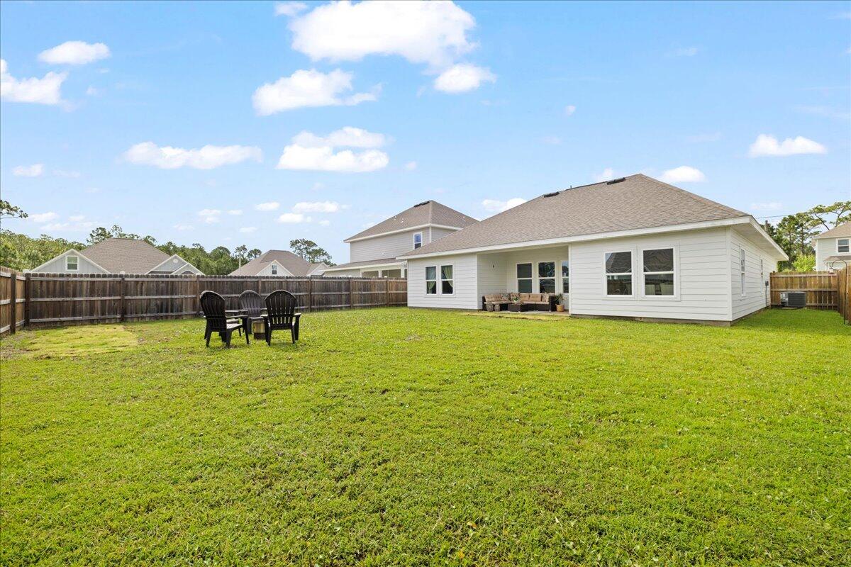 613 Las Roblas Grande Drive Santa Rosa Beach, FL 32459 - Photo 5 of 36 Covered Back Porch + Fully Fenced Yard