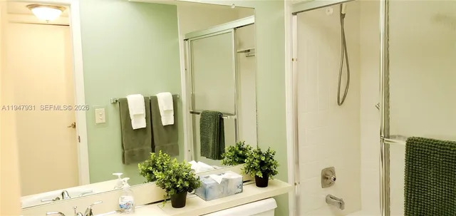 a living room with furniture and a dresser