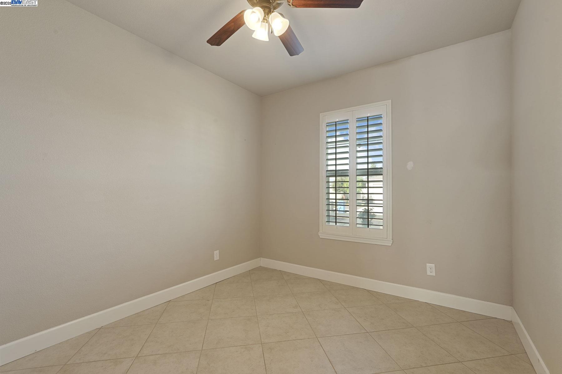 2961 Clear Pt Way Manteca, CA 95336 - Photo 36 of 54 a view of an empty room with a window
