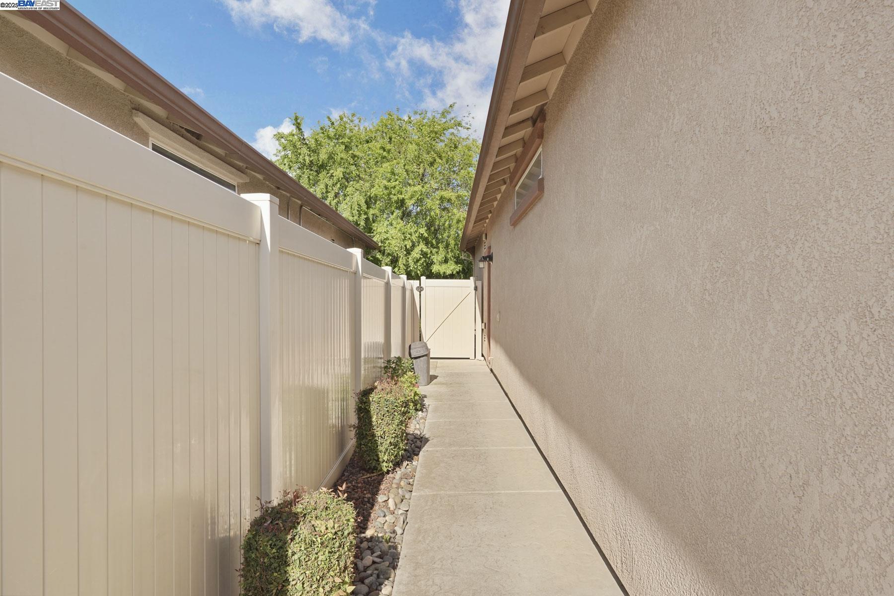 2961 Clear Pt Way Manteca, CA 95336 - Photo 46 of 54 a path view of a backyard