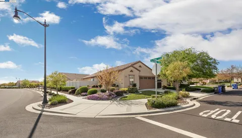 a view of a street with a house