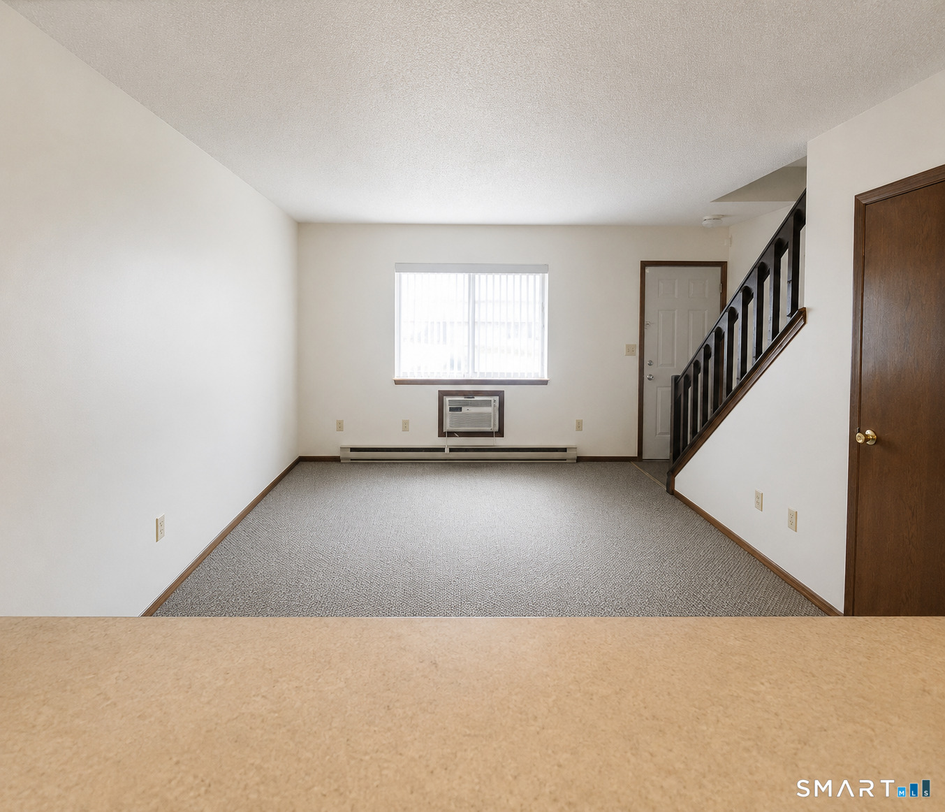 975 Meriden Road, Unit 101 Waterbury, CT 06705 - Photo 10 of 28 a view of a livingroom with a staircase
