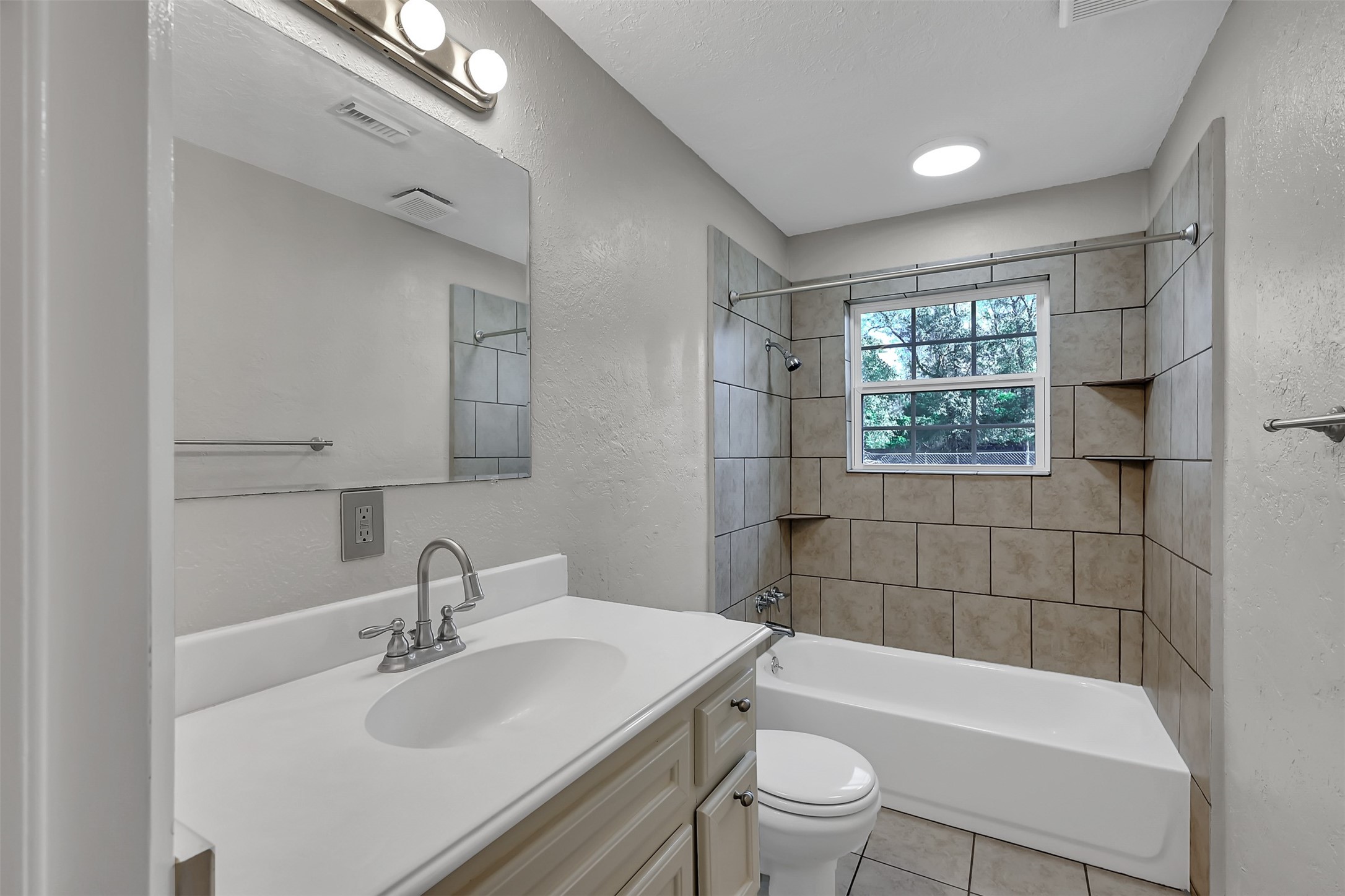 29806 Lazy Lane Spring, TX 77386 - Photo 14 of 22 a bathroom with a sink toilet tub and shower