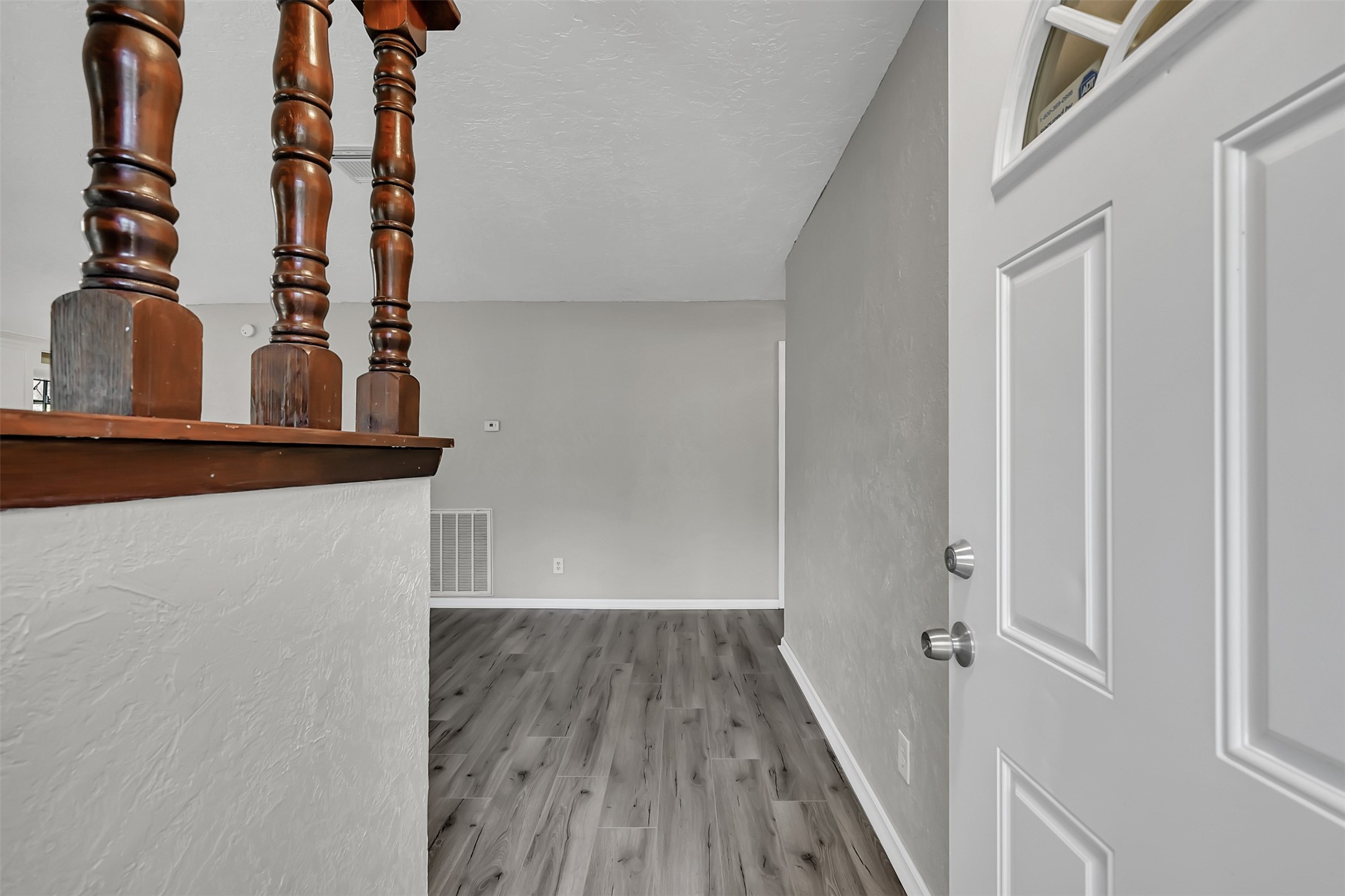 29806 Lazy Lane Spring, TX 77386 - Photo 2 of 22 view of entryway with wooden floor