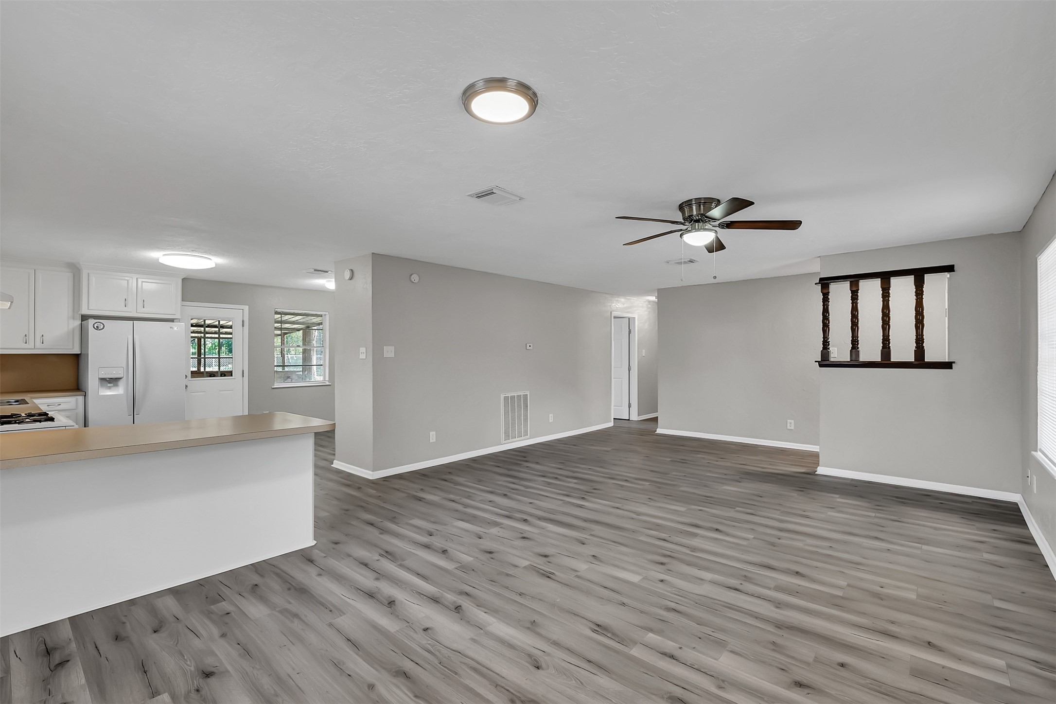 29806 Lazy Lane Spring, TX 77386 - Photo 3 of 22 a view of empty room with wooden floor