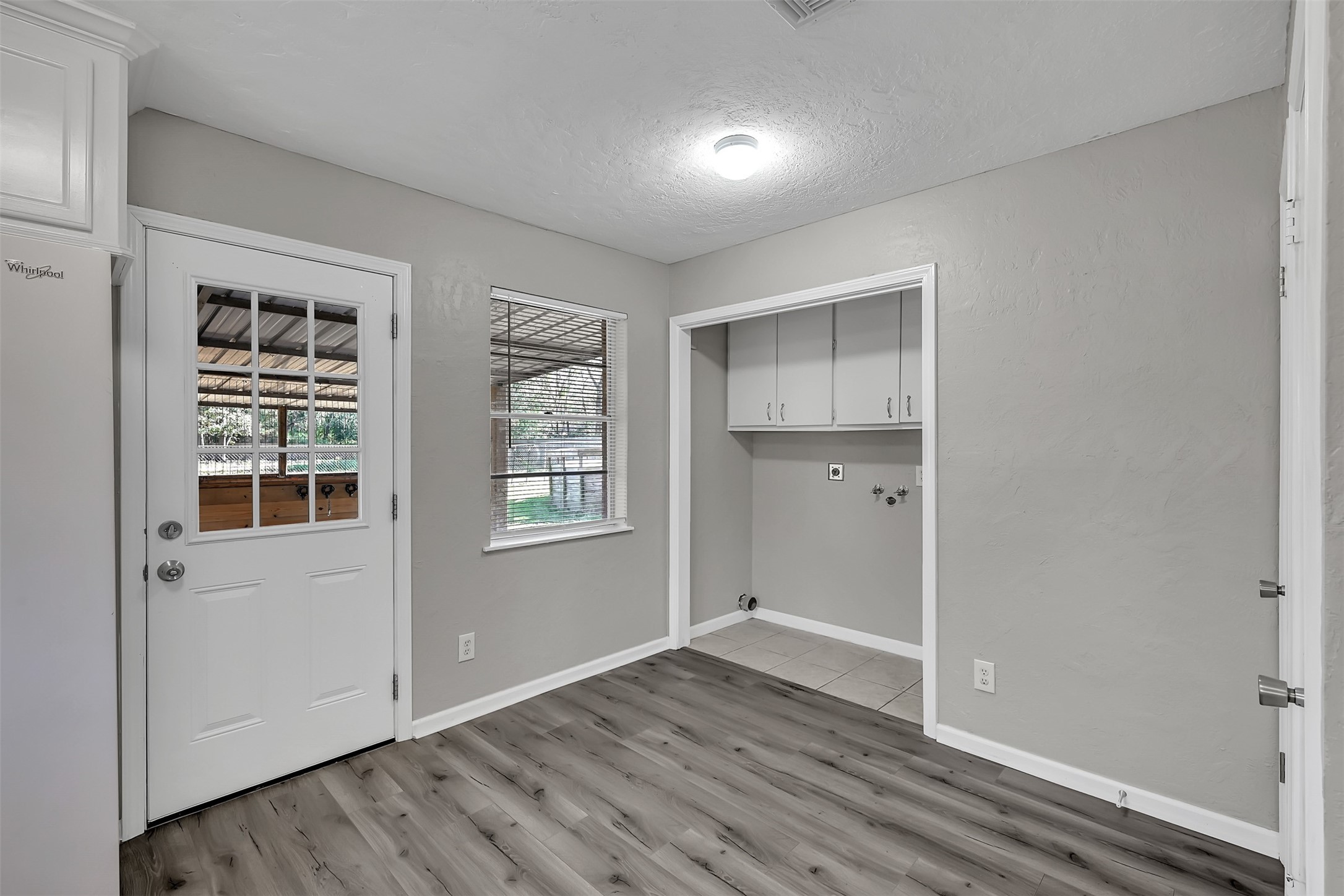 29806 Lazy Lane Spring, TX 77386 - Photo 6 of 22 an empty room with wooden floor and windows