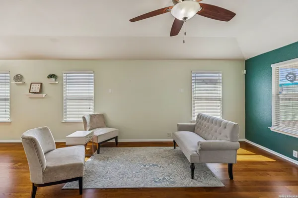 a living room with furniture and a window