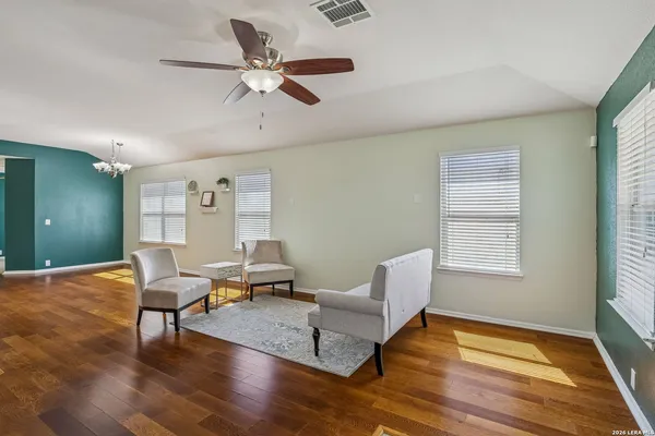 a living room with furniture and a window