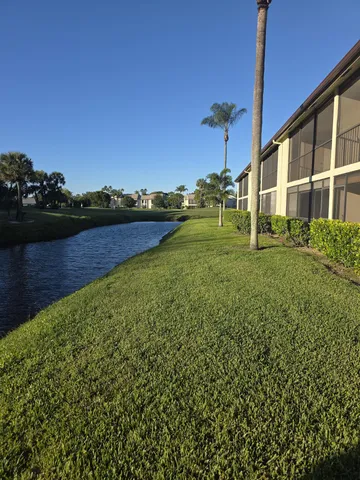 a view of building with trees in the background