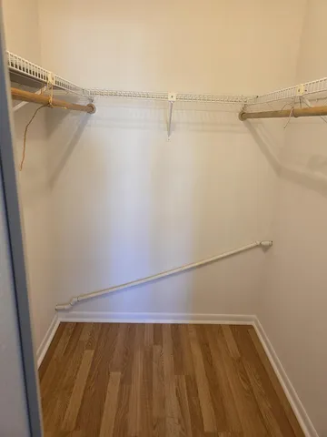 a view of a room with racks on the wall