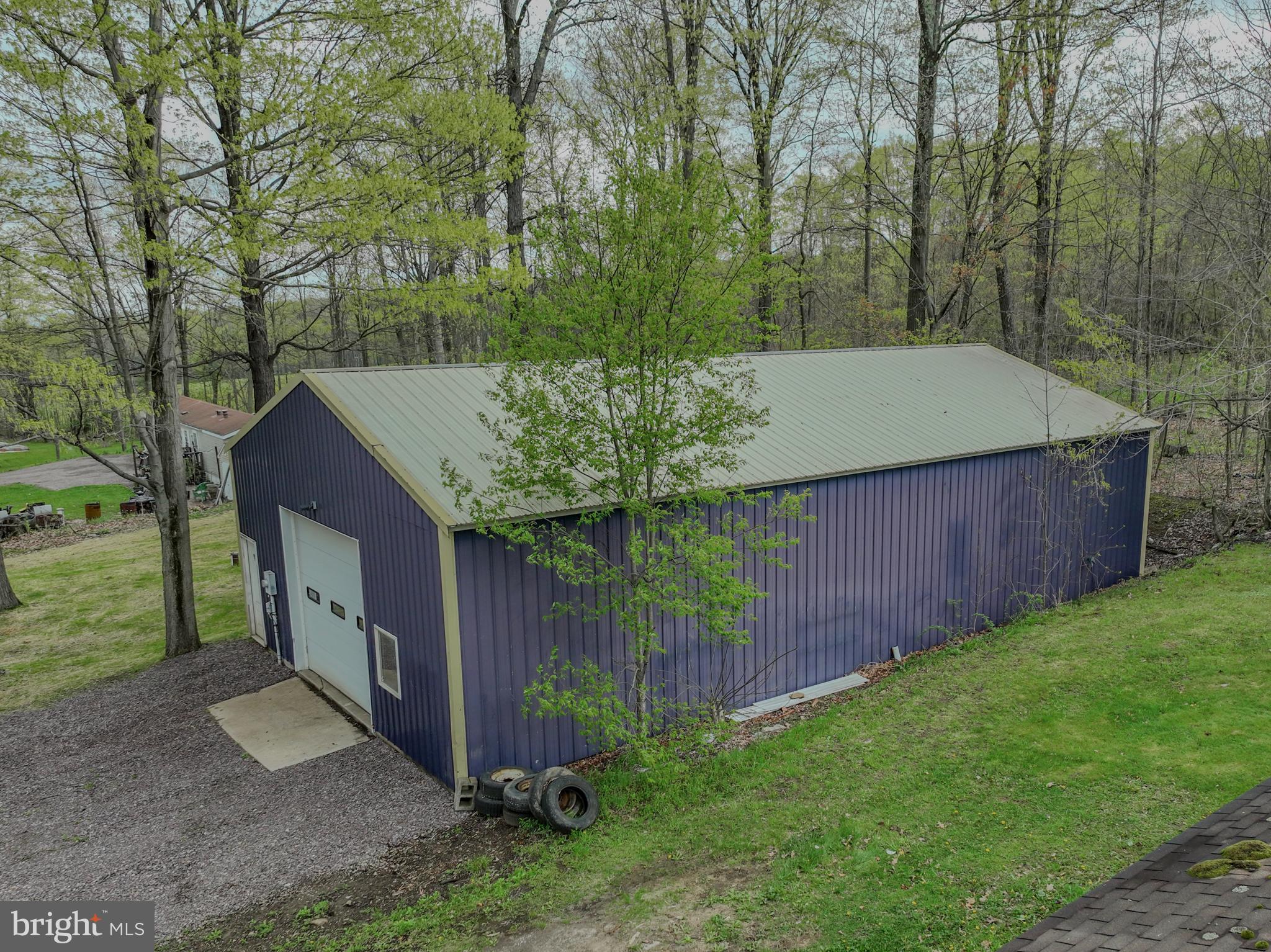 4376 Chestnut Ridge Road Grantsville, MD 21536 - Photo 3 of 51 a backyard of a house with lots of green space