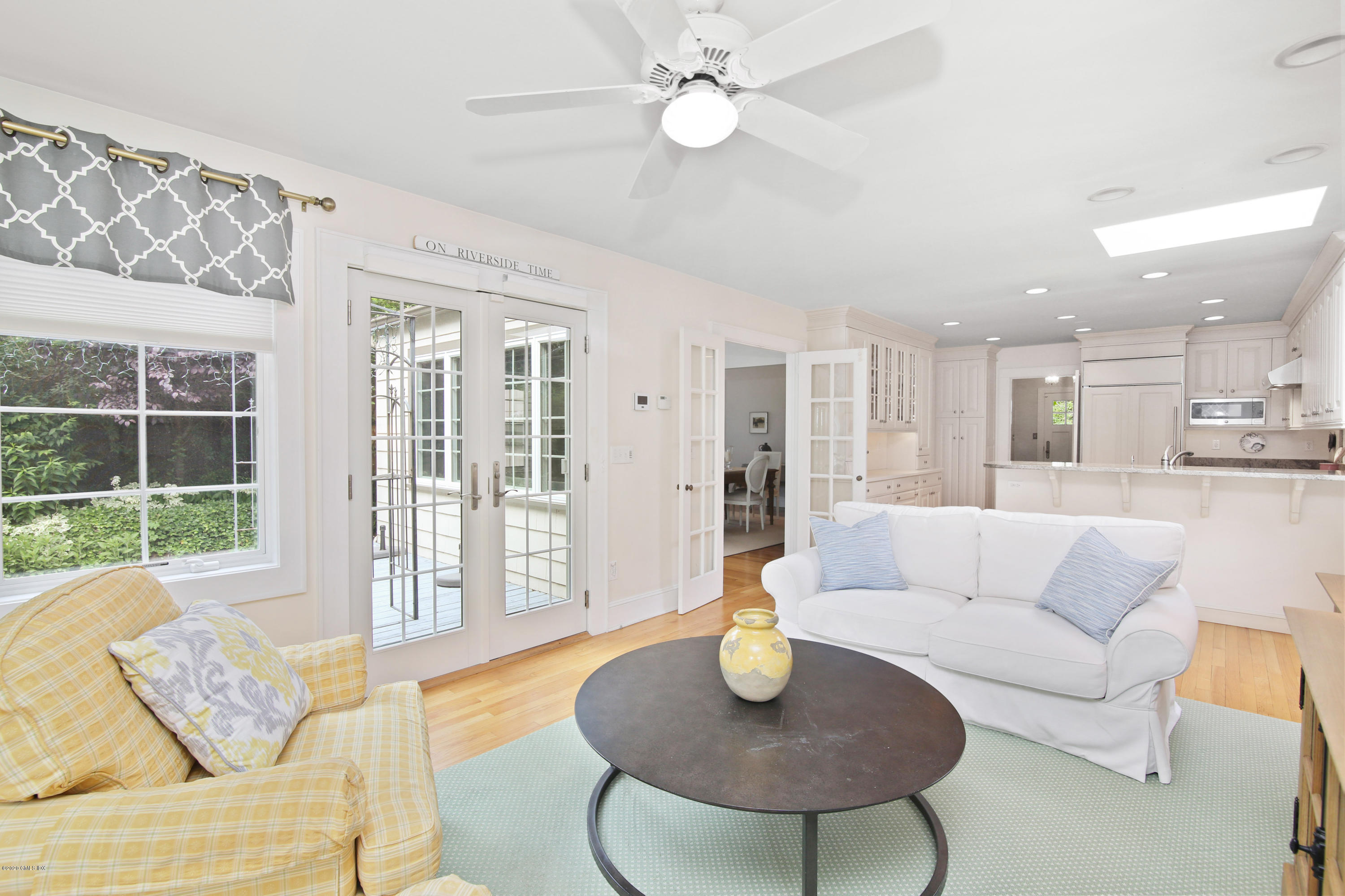 38 Oval Avenue Riverside, CT 06878 - Photo 14 of 33 a living room with furniture and a large window