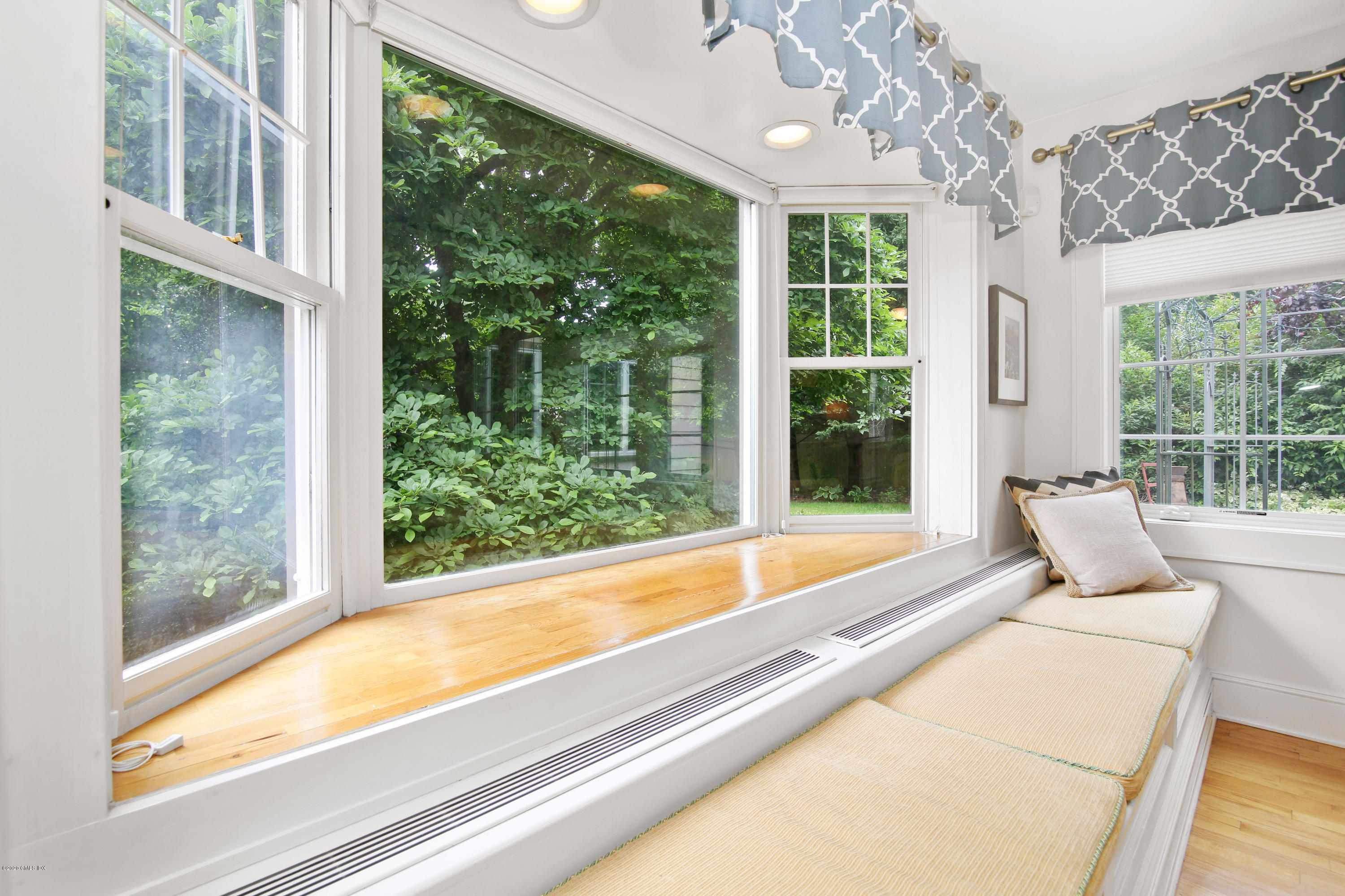 38 Oval Avenue Riverside, CT 06878 - Photo 15 of 33 a living room with large windows and furniture
