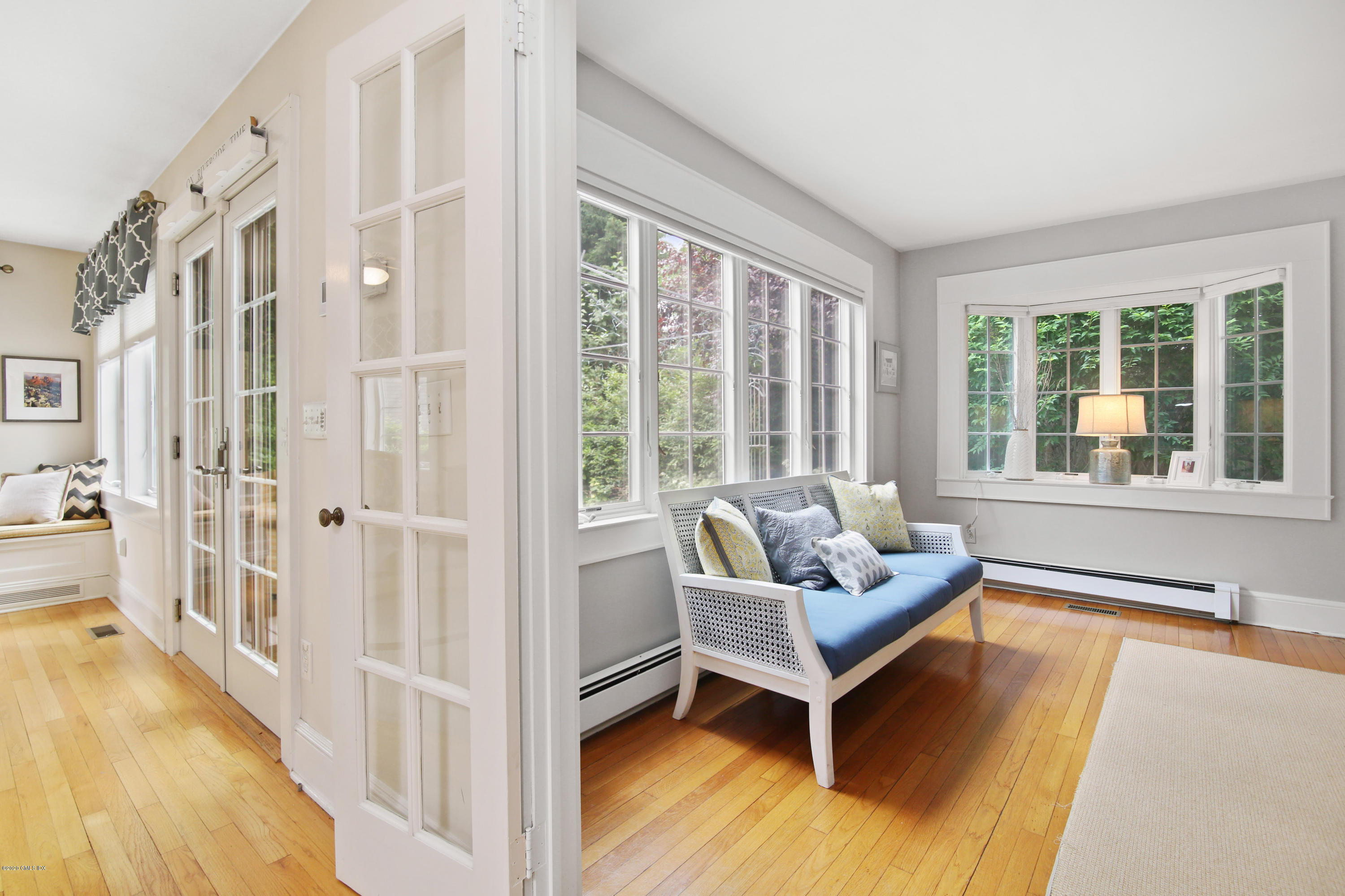 38 Oval Avenue Riverside, CT 06878 - Photo 17 of 33 a living room with furniture and a large window