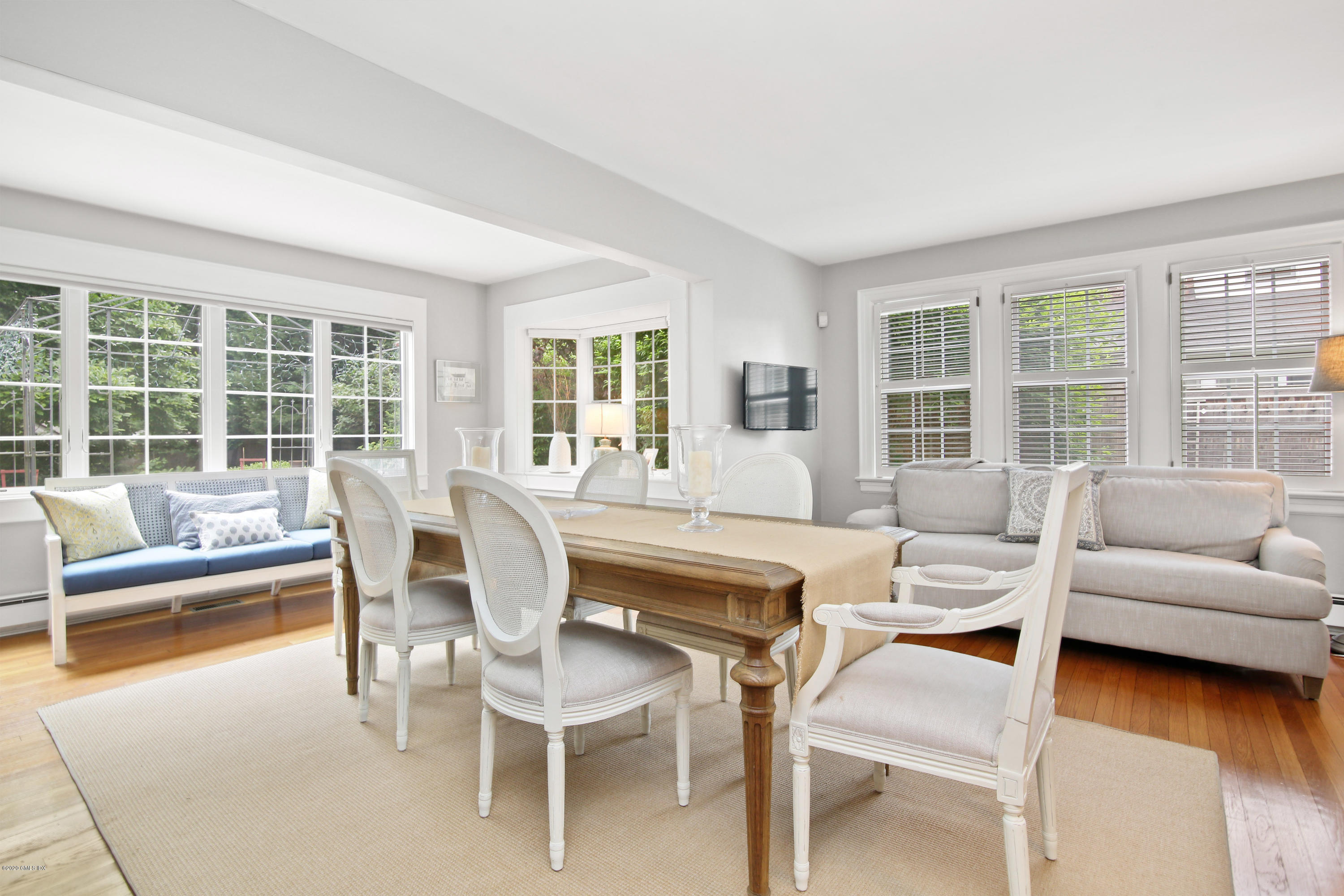 38 Oval Avenue Riverside, CT 06878 - Photo 18 of 33 a dining room with furniture and large windows