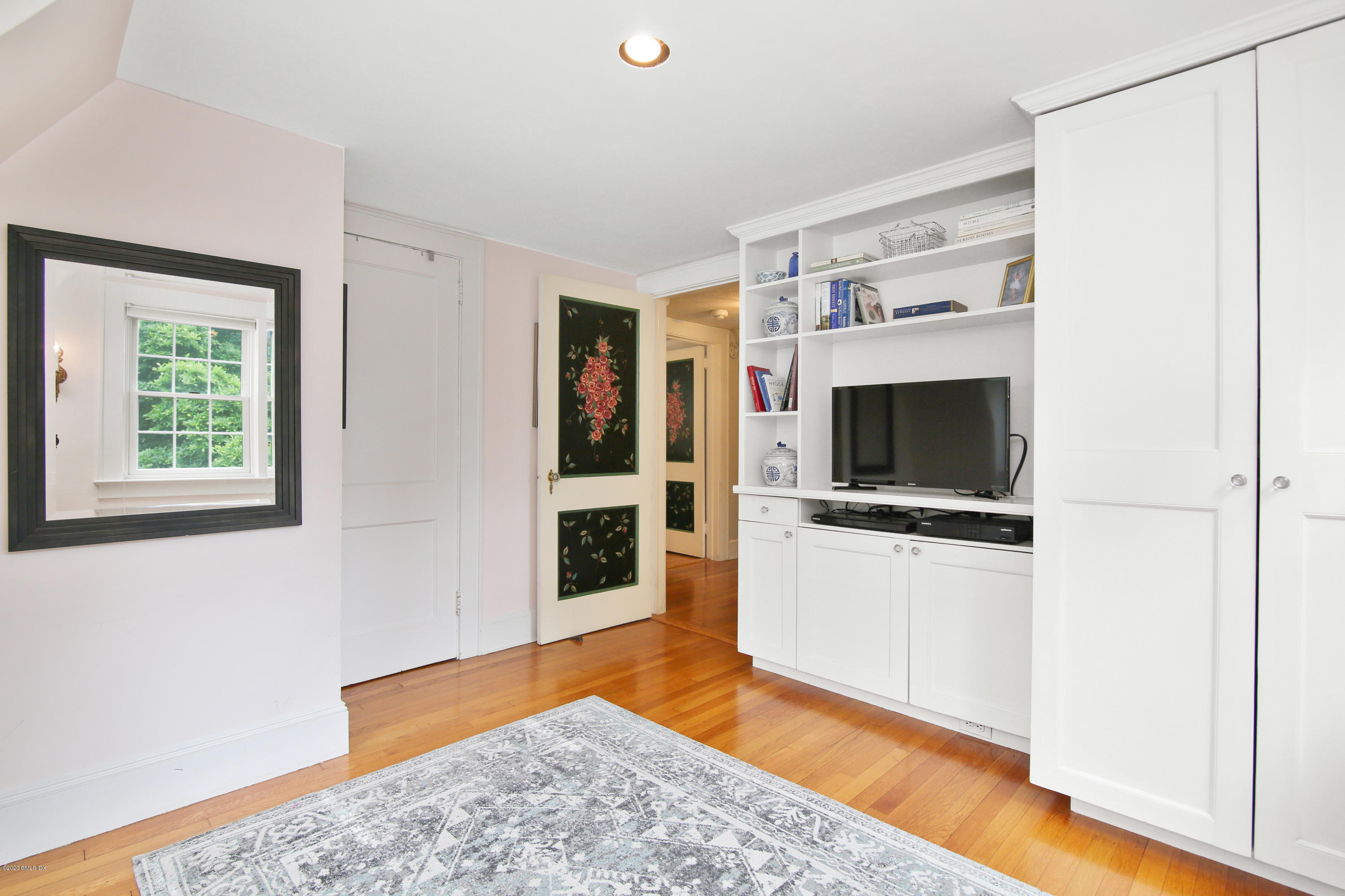 38 Oval Avenue Riverside, CT 06878 - Photo 21 of 33 a living room with stainless steel appliances kitchen island granite countertop a stove and a microwave