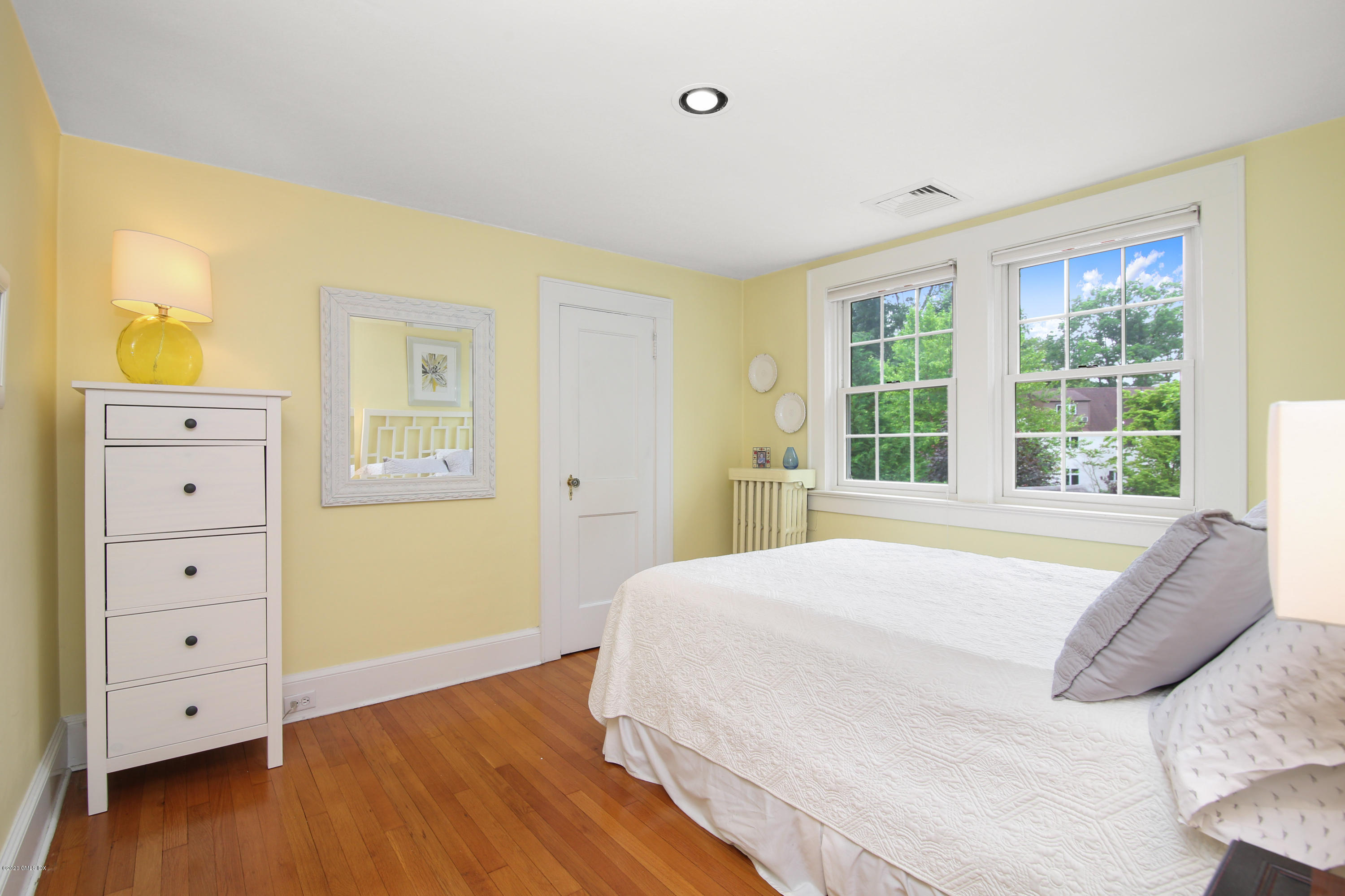 38 Oval Avenue Riverside, CT 06878 - Photo 24 of 33 a bedroom with a bed and a window