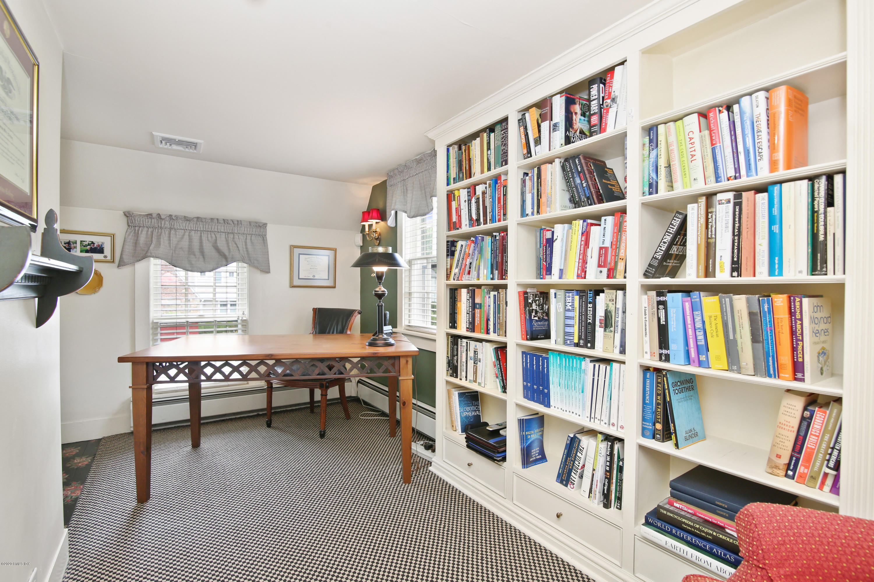 38 Oval Avenue Riverside, CT 06878 - Photo 26 of 33 a reading room with furniture book shelf and a book shelf