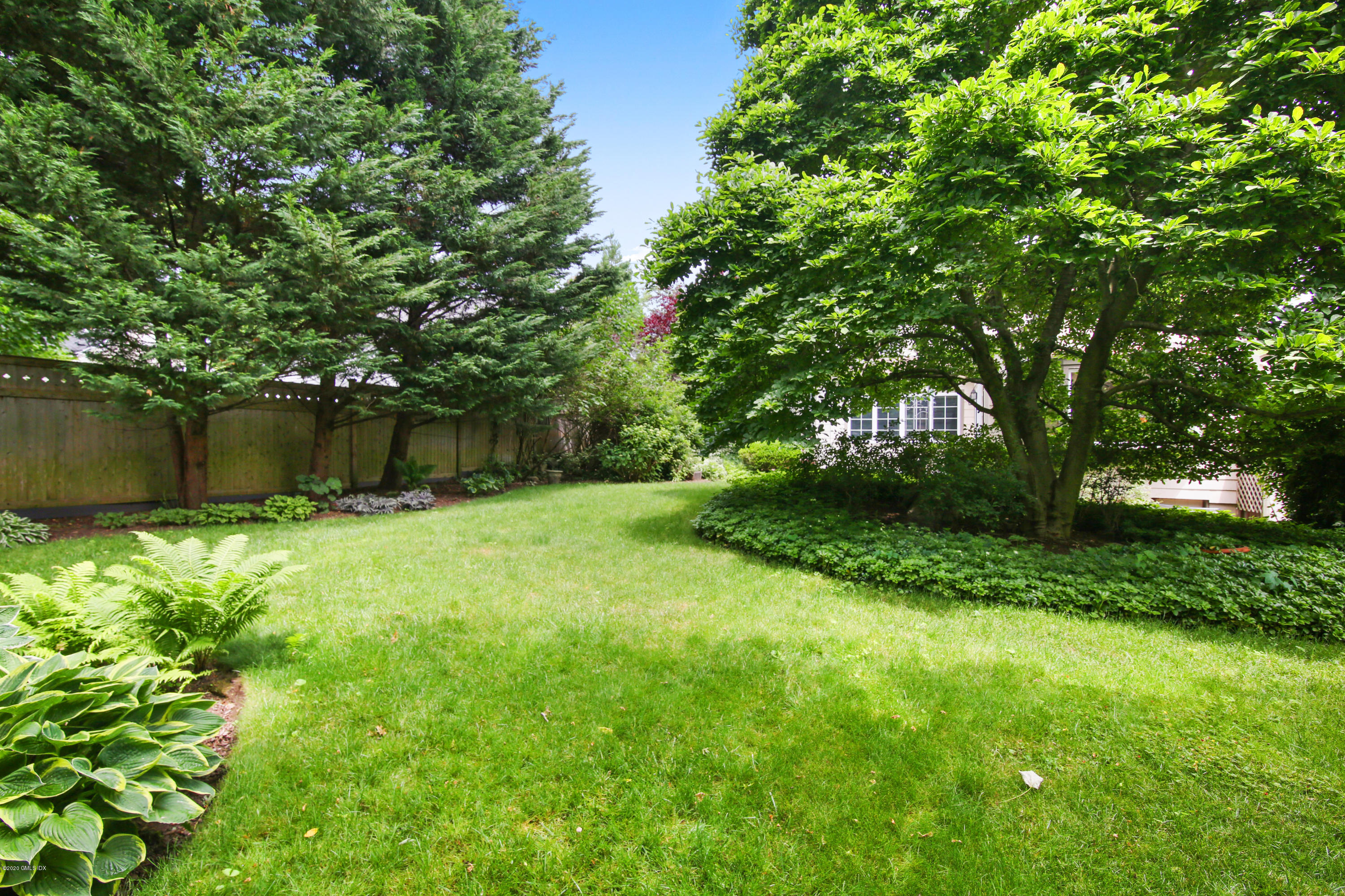 38 Oval Avenue Riverside, CT 06878 - Photo 3 of 33 a view of a backyard