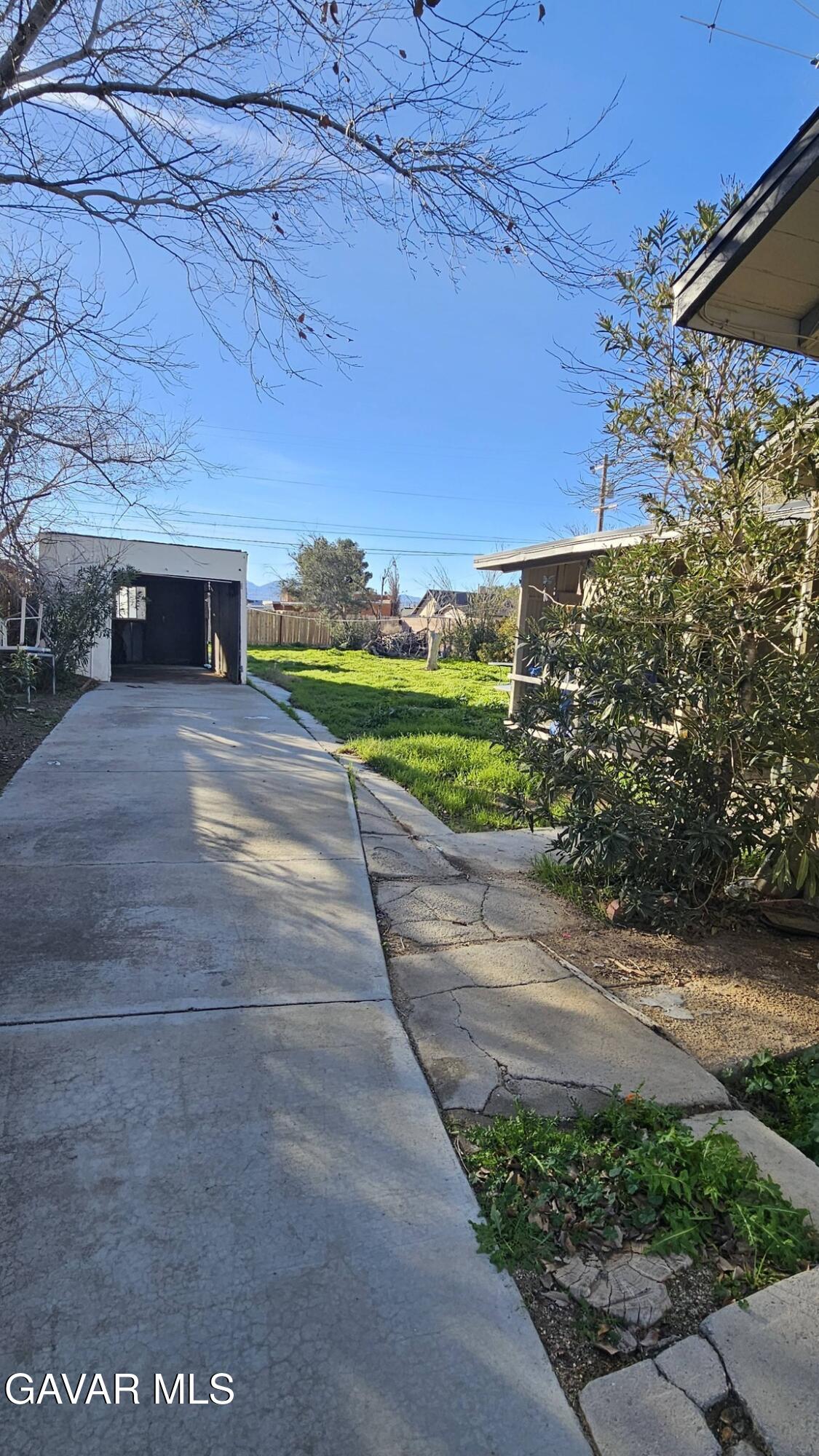 15623 M Street Mojave, CA 93501 - Photo 4 of 9 a view of a back yard