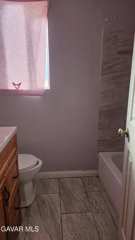 a bathroom with a toilet