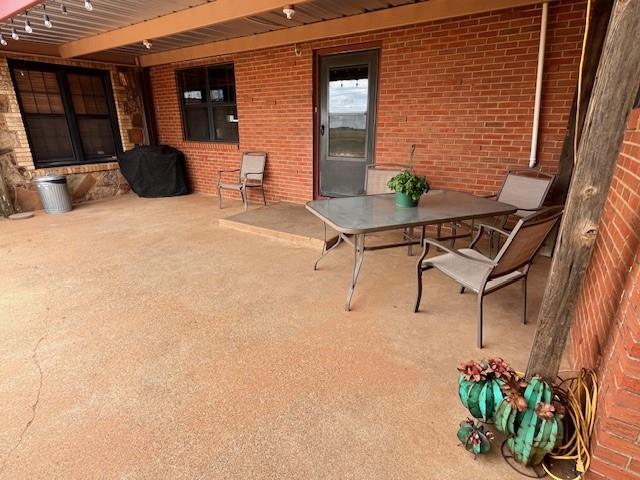 1163 State Highway 70 Rotan, TX 79546 - Photo 6 of 40 private patio at side entry