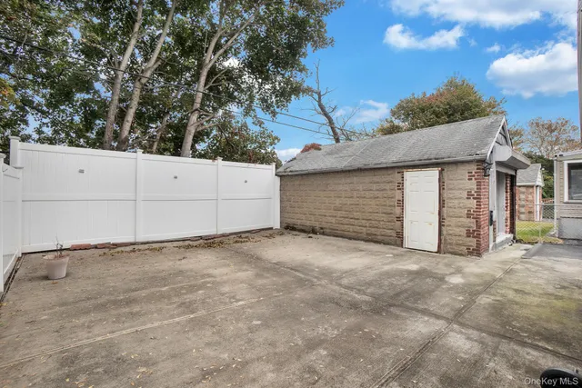 a front view of a house with a garage