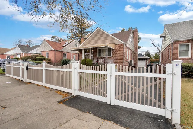 a front view of a house with a porch