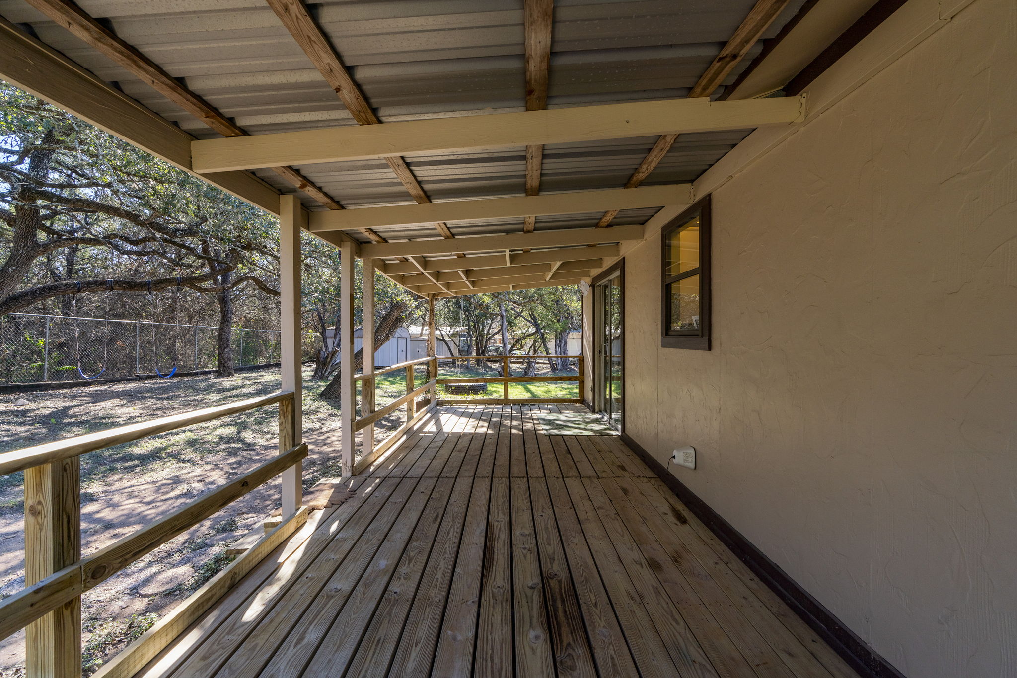 500 Grand Prairie Circle Dripping Springs, TX 78620 - Photo 25 of 40 a view of balcony with wooden floor