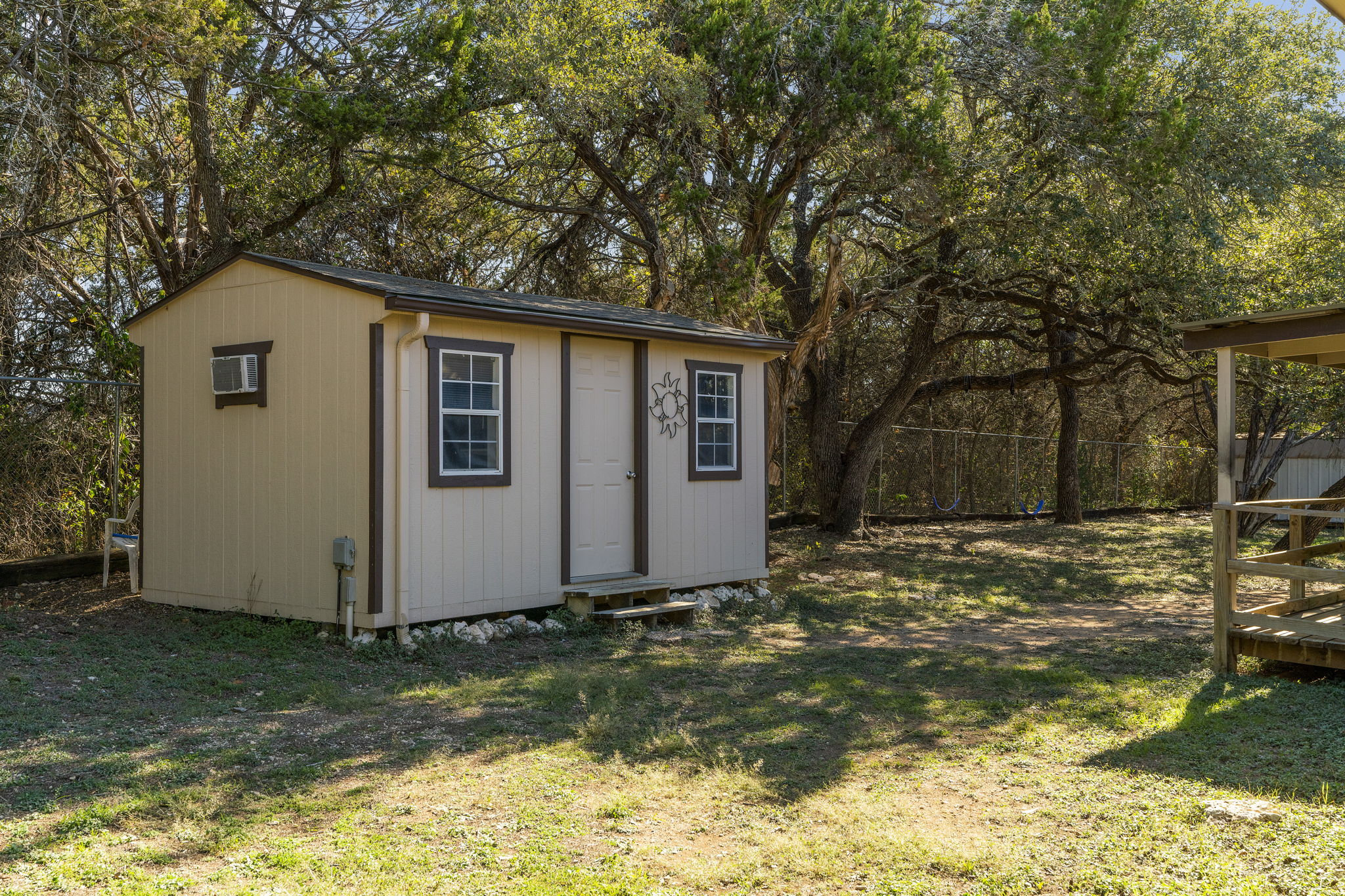 500 Grand Prairie Circle Dripping Springs, TX 78620 - Photo 29 of 40 View of shed with view of scattered trees
