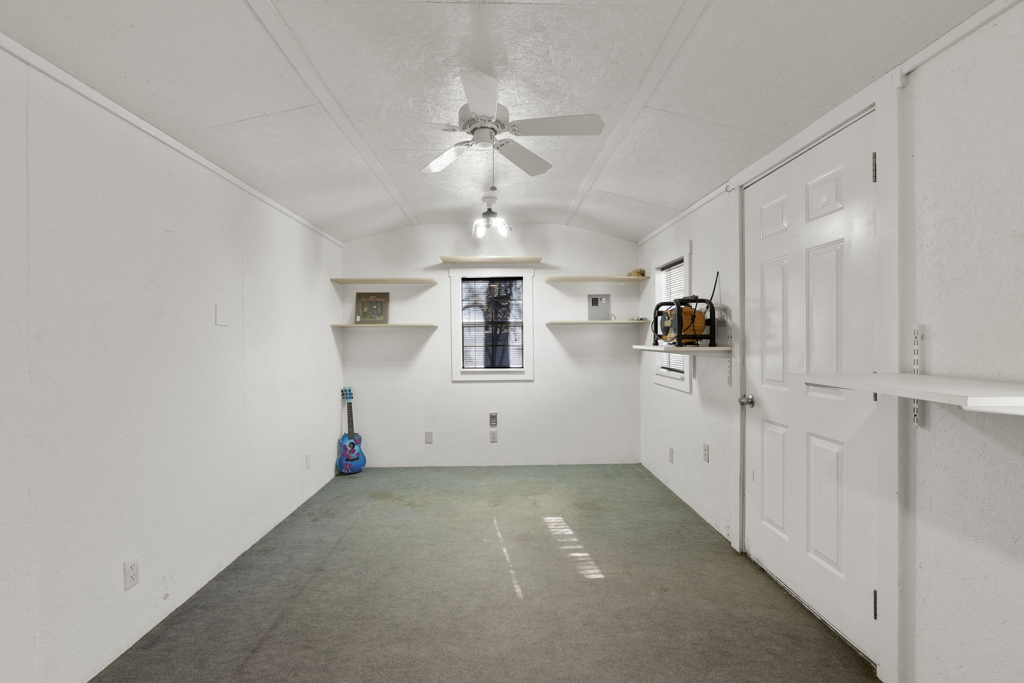 500 Grand Prairie Circle Dripping Springs, TX 78620 - Photo 30 of 40 wooden floor in an empty room with a window