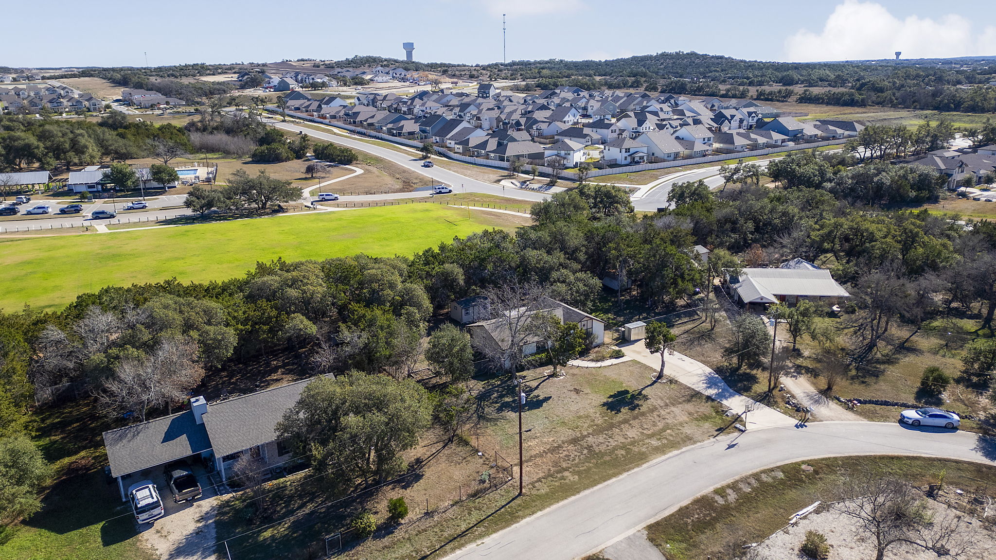 500 Grand Prairie Circle Dripping Springs, TX 78620 - Photo 36 of 40 Aerial overview of property's location featuring nearby suburban area