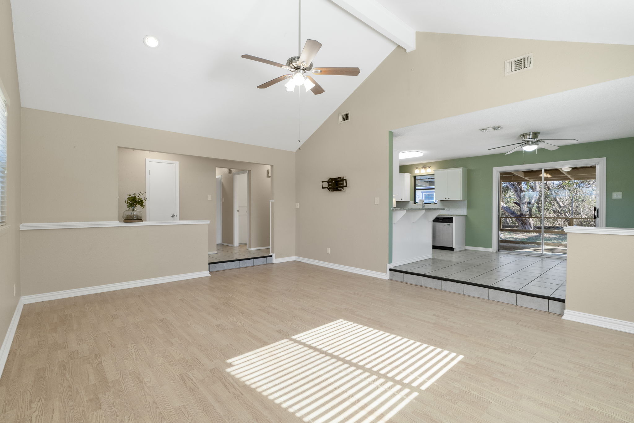 500 Grand Prairie Circle Dripping Springs, TX 78620 - Photo 7 of 40 a view of an empty room with a window and cabinet