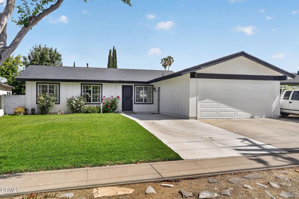 2377 Fitzgerald Road Simi Valley, CA 93065 - Photo 1 of 30 a front view of a house with garden