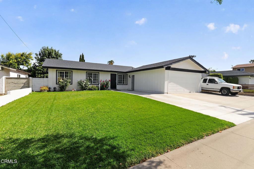 2377 Fitzgerald Road Simi Valley, CA 93065 - Photo 4 of 30 a front view of a house with garden