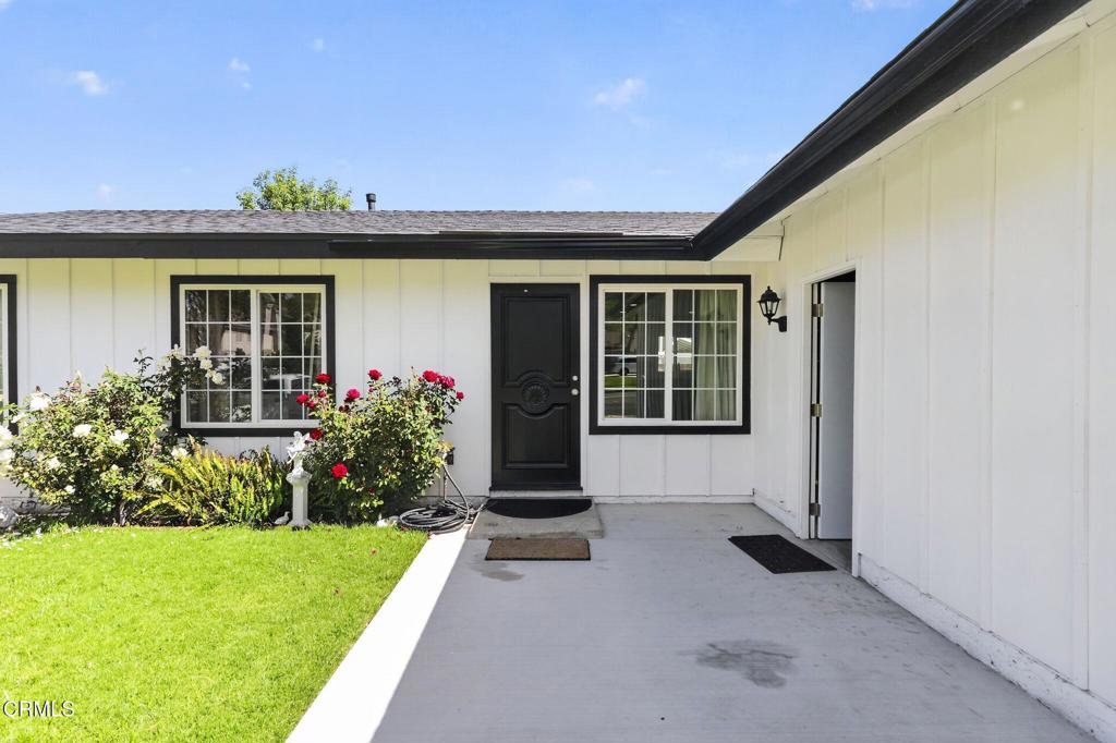 2377 Fitzgerald Road Simi Valley, CA 93065 - Photo 5 of 30 a front view of a house with a garden