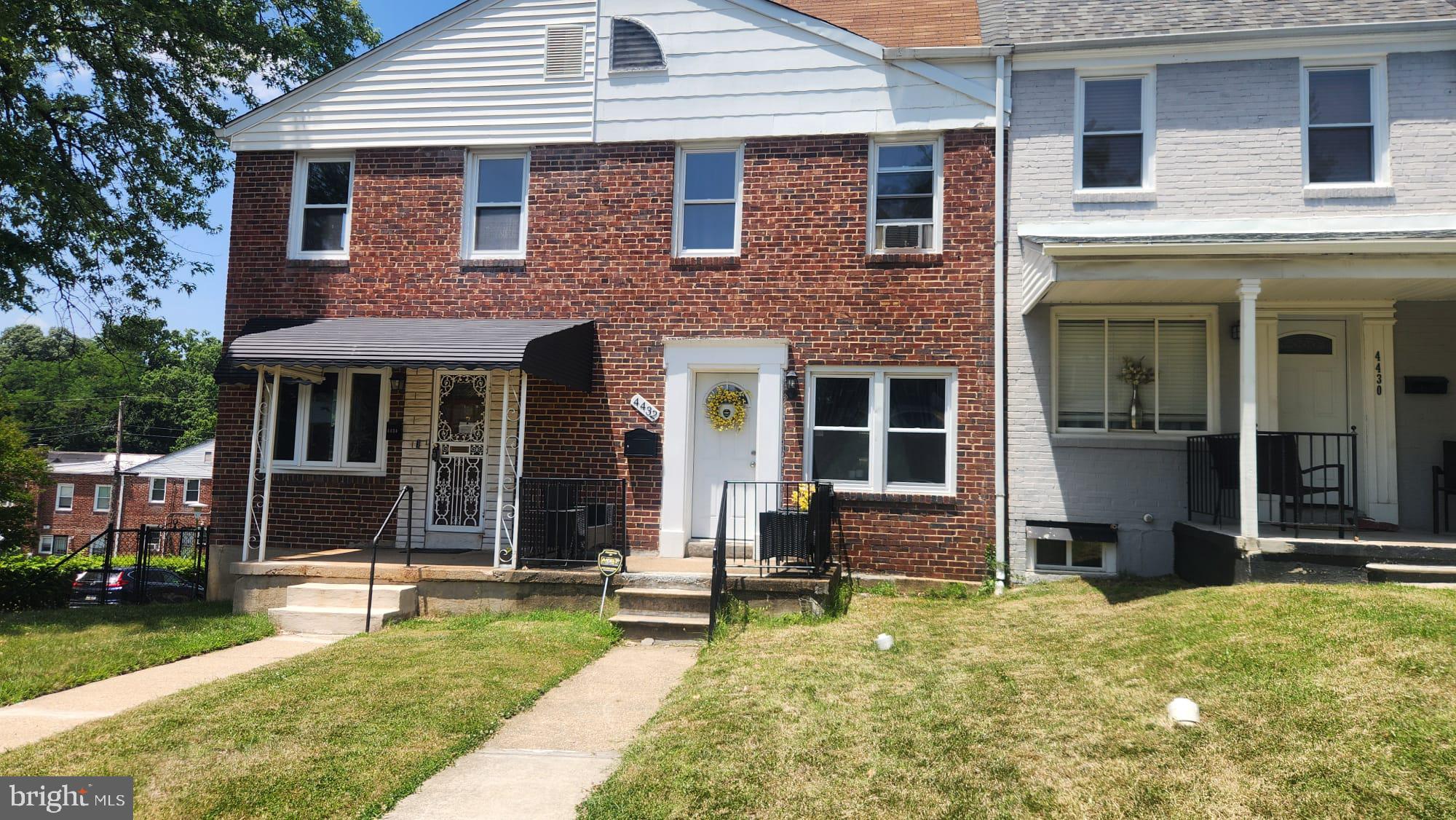 4432 Manorview Road Baltimore, MD 21229 - Photo 24 of 24 Charming brick townhouse with greenery.