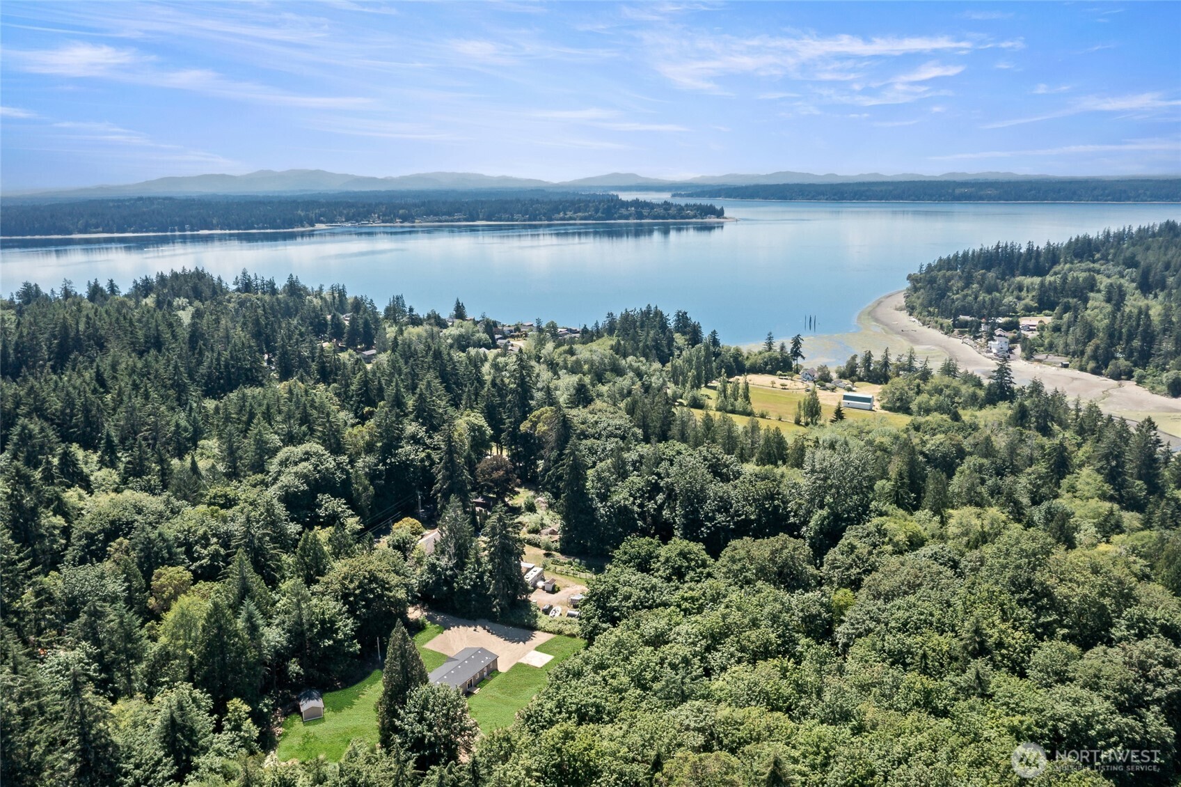17217 80th Street Southwest Longbranch, WA 98351 - Photo 5 of 39 a view of a lake from a yard